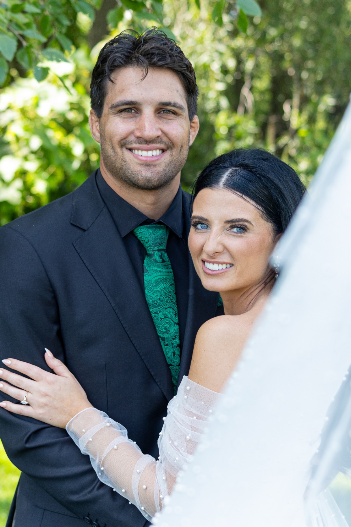 Wedding couple in green tie