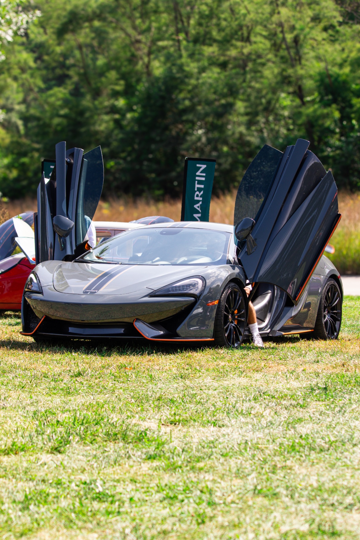 McLaren supercar with doors up